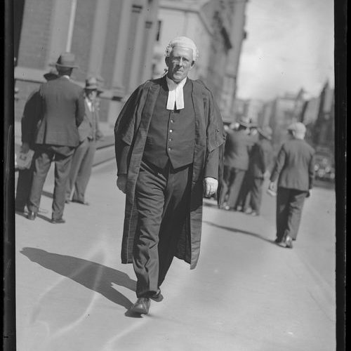 Percy Coleman outside the Supreme Court wearing a wig and gown, New South Wales, 10 March 1933 [picture]. [nla.pic-vn6266068]