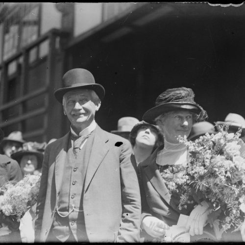 Lieutenant Governor of New South Wales Sir William Portus Cullen and Lady Eliza Jane Cullen holding a bouquet of flowers, New South Wales, ca. 1930 [picture]. [nla.pic-vn6266883]